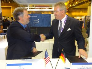 Dean Amhaus of The Water Council and Dr. Michael Prange of the German Water Partnership agree to collaborate on water technology advancements and business development in their respective markets at WEFTEC 2016.